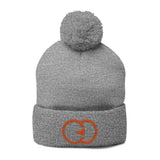 Cozy Pom-Pom Knit Cap with Embroidered Design